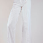 White stretch pants with printed waistband