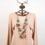 Beige stretch cotton top with necklace