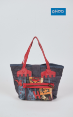 Blue cotton handbag with appliqués and print