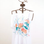 Tunica bianca in tulle ricamato monospalla