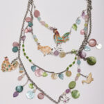 Four-strand necklace with enameled farm animals
