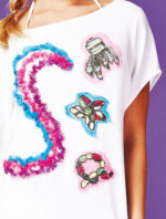 Tunica bianca con ricamo - immagine 2