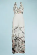 Elegant V-neck summer jumpsuit featuring a floral and geometric pattern in neutral and pastel shades, ideal for casual occasions and summer events.