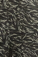 Abstract pattern in dark and light shades, with wavy stripes on a black background, ideal for elegant or casual wear.